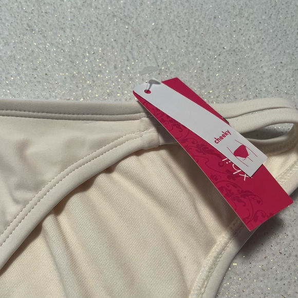 Brand new with tags size XL cream colored swim bottoms from Xhilaration - Picture 3 of 4